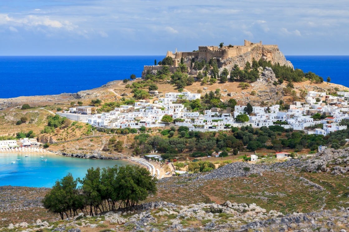 'View from the road down to the popular town of Lindos on the Island of Rhodes Greece' - Rodi